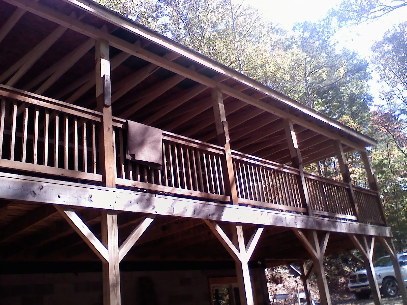 Timber framing under a new elevated porch and deck — Roof Leak Repair in Red Creek by Roofing Brothers